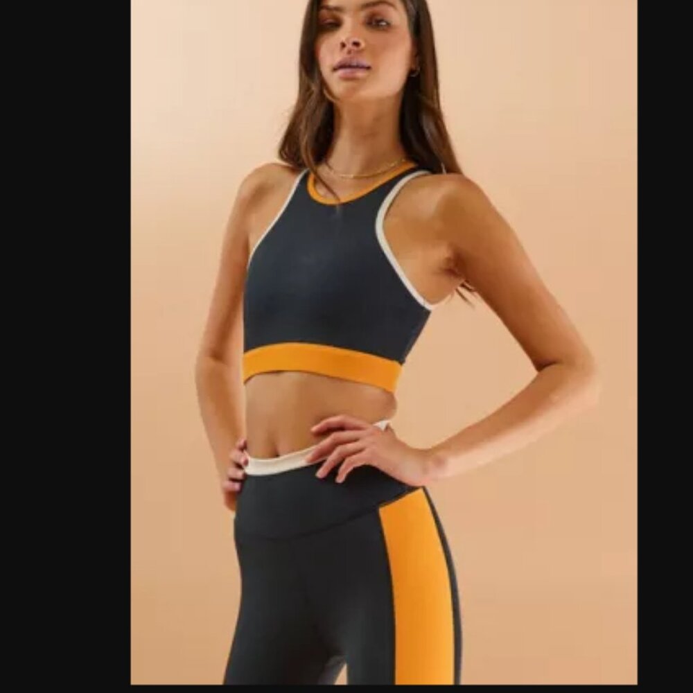 Wilo sport  XS black and orange with white piping trim high neck sports bra